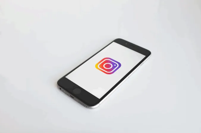 A phone displaying the Instagram app on the screen