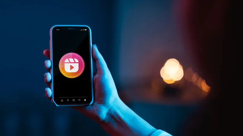 Smartphone screen displaying the Instagram Reels icon.