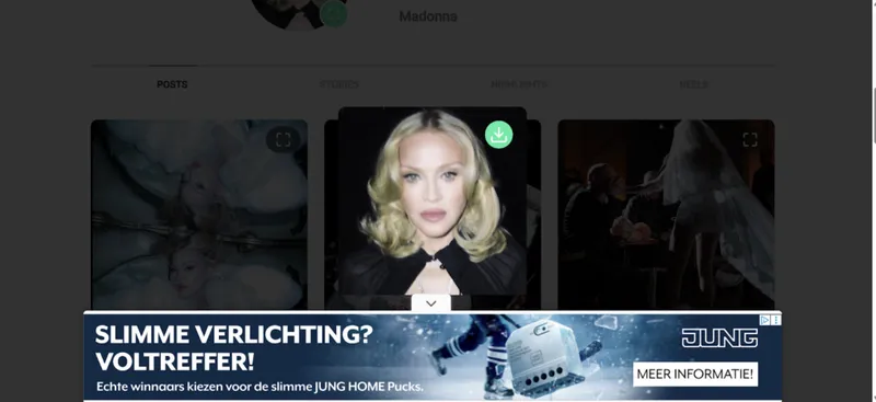 Screenshot of Madonna’s Instagram photo on GramSnap with the download button visible and many ads covering the page. Screenshot of Madonna’s Instagram photo on GramSnap with the download button visible and many ads covering the page.